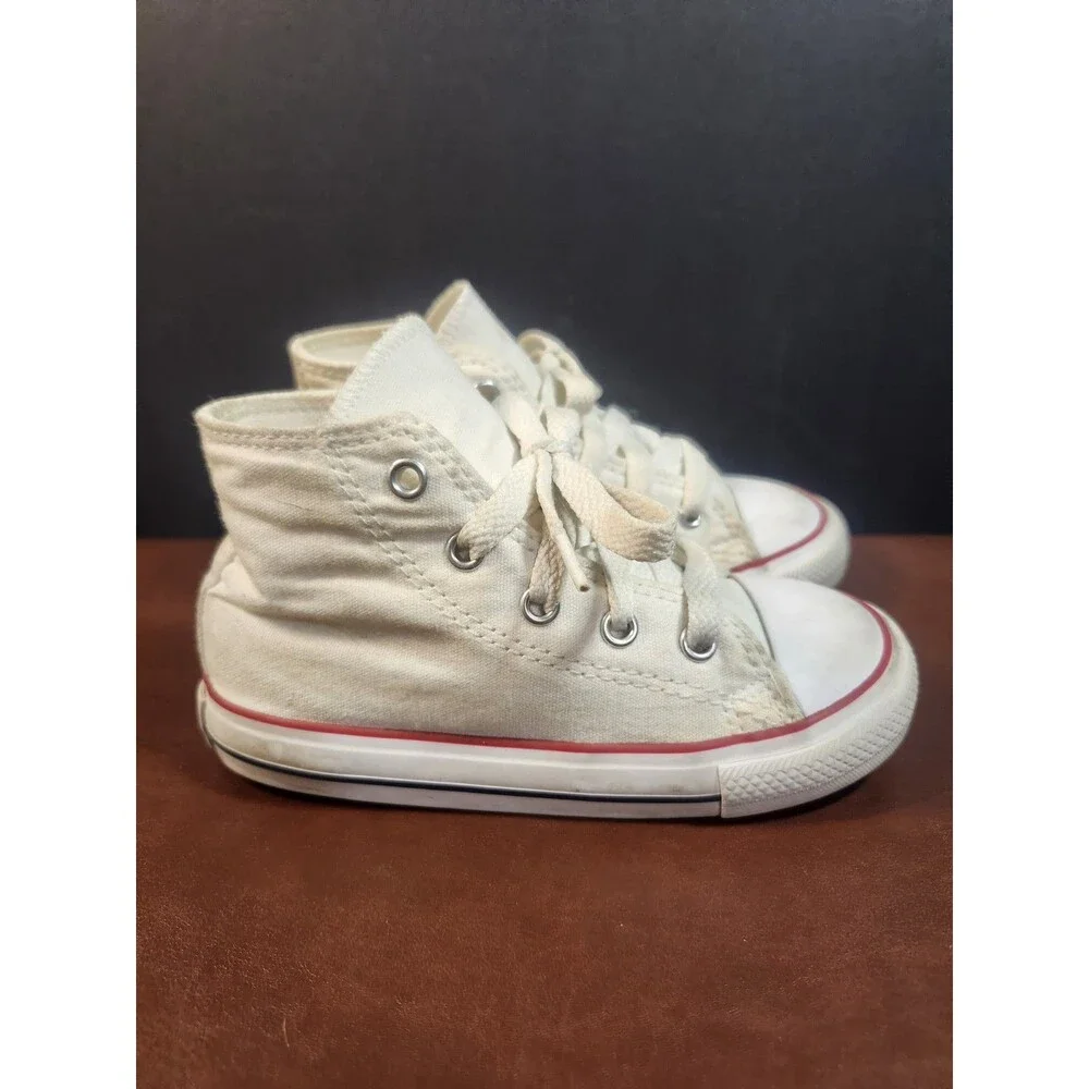 white canvas Converse Chuck Taylor All Star high-top sneakers